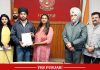 DC Amrit Singh hands over tablets to promising students