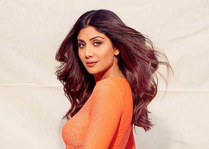 Shilpa Shetty Dazzles in Coral Red at a Water Purifier Launch — Indian  Fashion