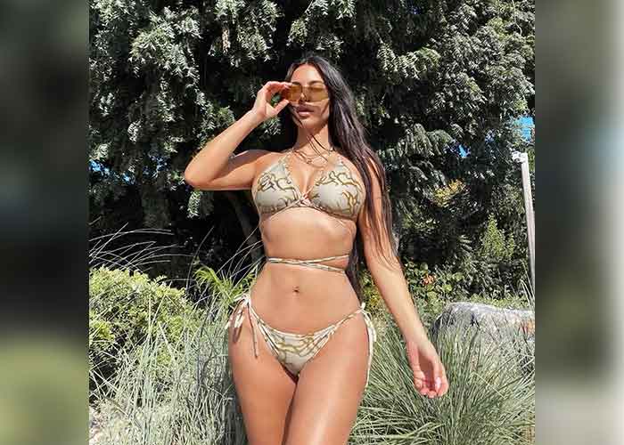Kim Kardashian flaunts tie up bikini