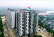 Tricolor hoisted at rooftop of Hampton Homes
