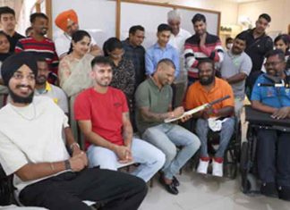 Punjab Kings players interact with patients with spinal injuries