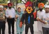 Devotees take selfies with Election Mascot Shera