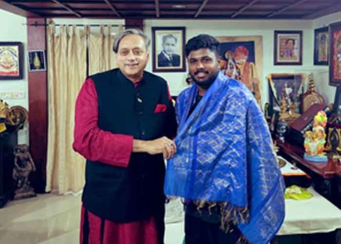 Congress MP Shashi Tharoor with batter Sanju Samson