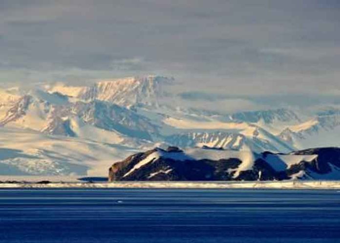 Antarctic amber light on mountains