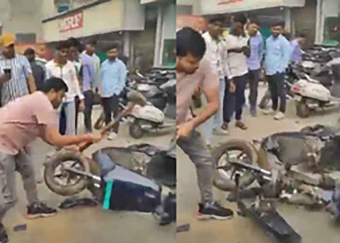 Man smashes Ola scooter