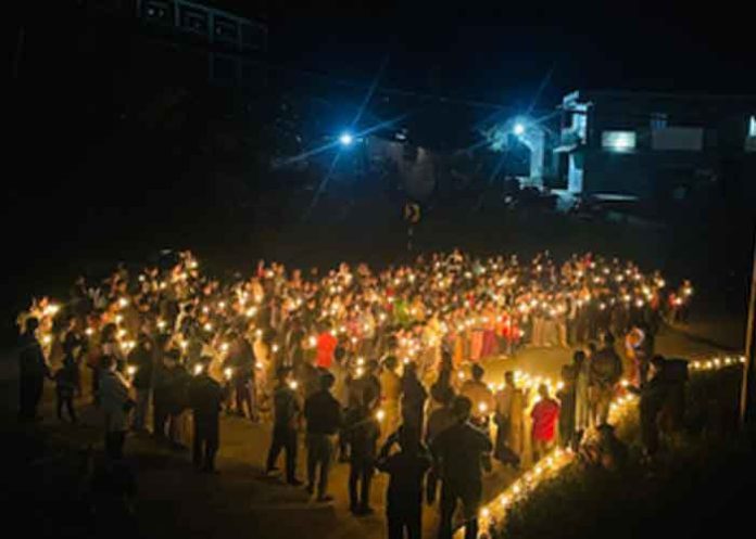 Meitei group holds candlelight march