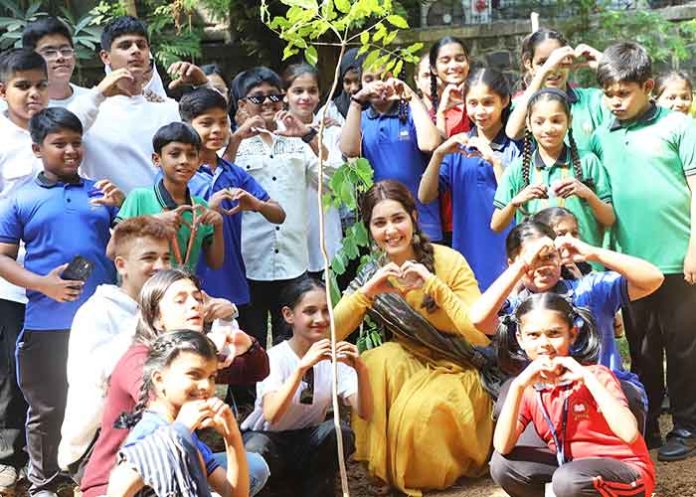 Raashii Khanna plants saplings with 100 kids