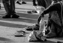 beggar on road