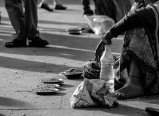 beggar on road