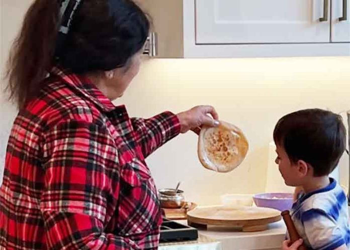 Preity Zinta son Jai making rotis with grandmother