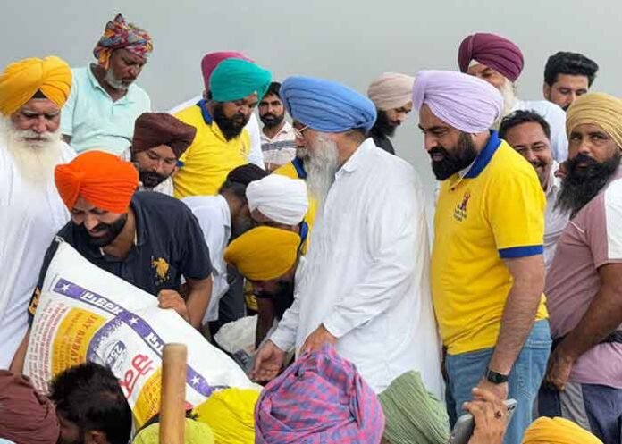 Laljit Bhullar Distributes Relief Materials to Flood