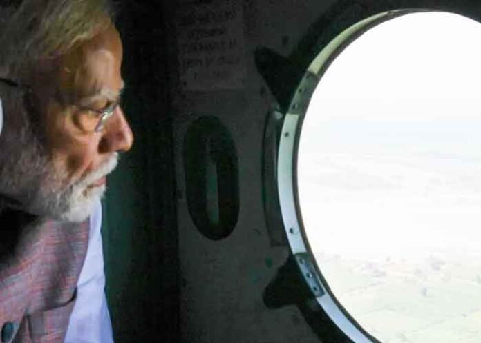 PM Modi conducts aerial survey in flood-hit