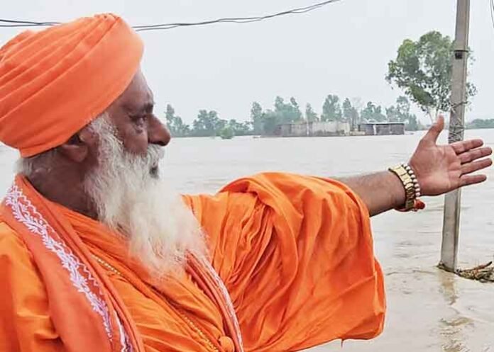 Sant Seechewal on flood