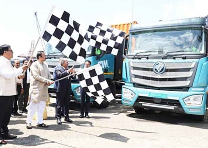 Sarbananda Sonowal flags off EV trucks