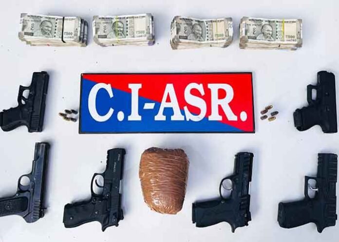 Six Pistols, 1kg Heroin, Rs.6-lakh Drug Money