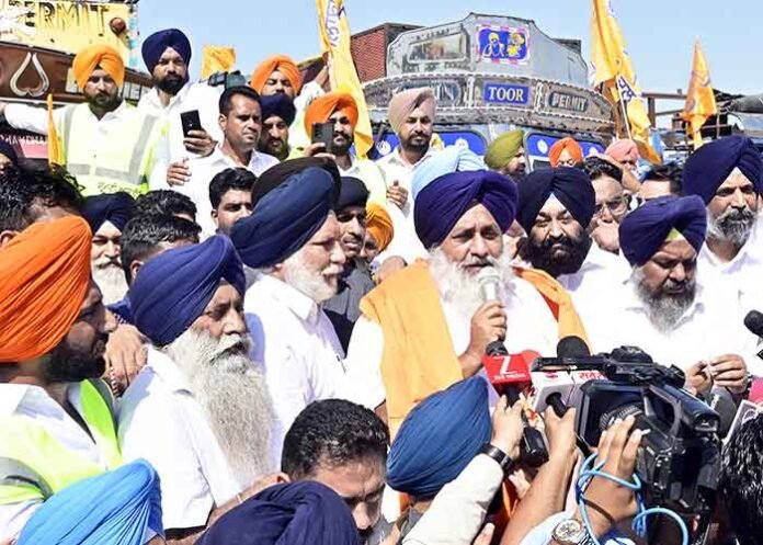 Sukhbir Badal flags off 100 trucks