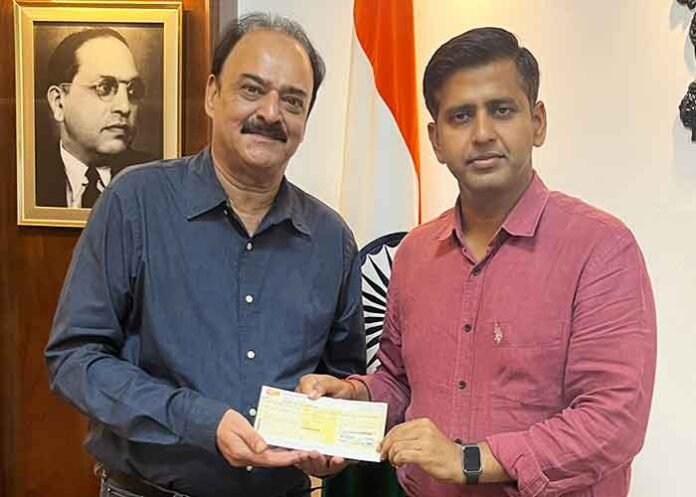 Cheque of Rs. 11 lakh presented to DC