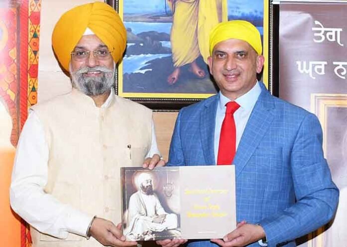 Book presented to Karamjeet Singh