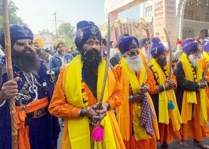 Devotees welcome Guru Tegh Bahadur Ji Nagar Kirtan