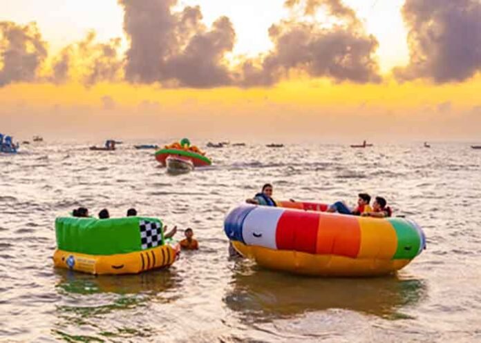 Tourists visit Shivrajpur beach