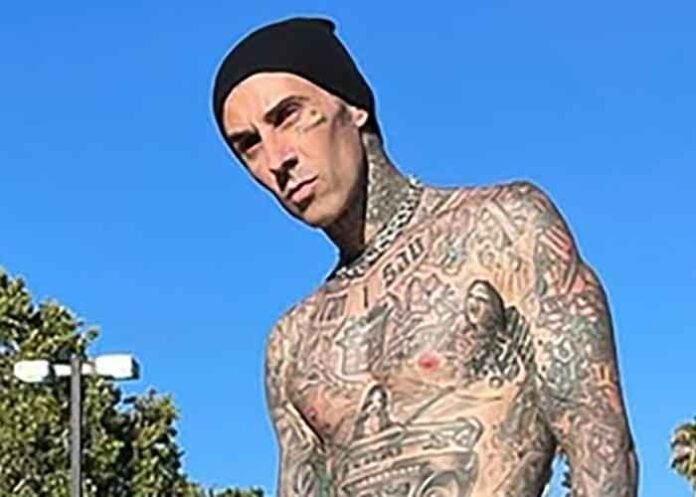 Travis Barker unveils tattoos