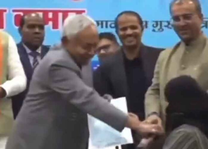 Nitish Kumar faces criticism for removing hijab of woman doctor