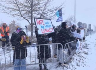 About 100 clergy arrested at Minneapolis airport in anti-ICE protest