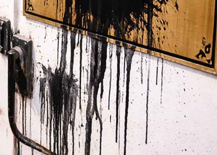 Activists smear black ink on Bhopal Mayor nameplat