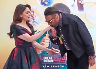 Jackie Shroff kisses Madhuri Dixit hand