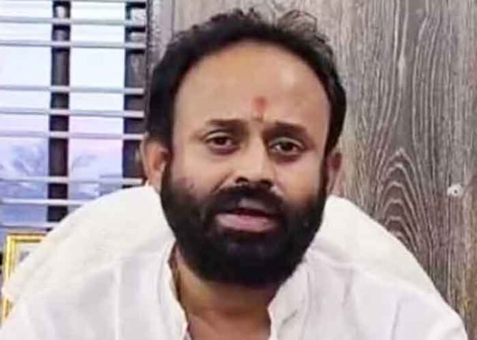 suspend leader Rajeev Gowda