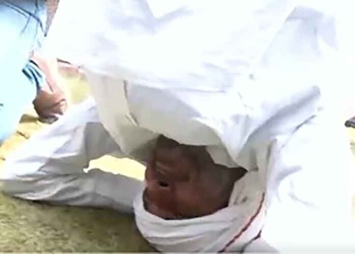 Congress MLA Babu Jandel performs headstand protest