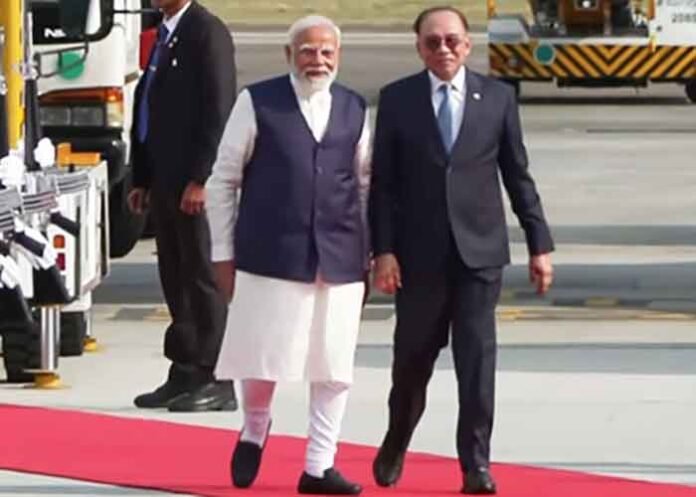 PM Modi welcomed by Malaysian counterpart Anwar Ibrahim