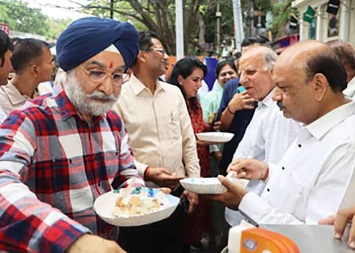 TS Sandhu enjoys street food