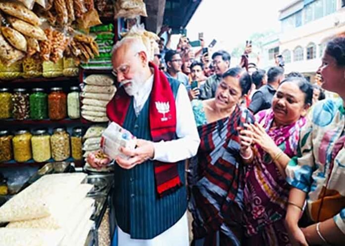 PM Modi stops for popular street snack in Jhargram