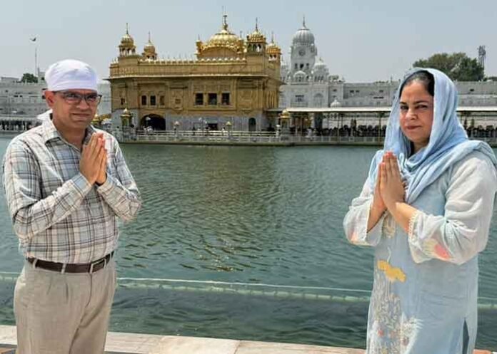 Commissioner of Jalandhar Division Shri Ramvir with Jaspreet Kaur