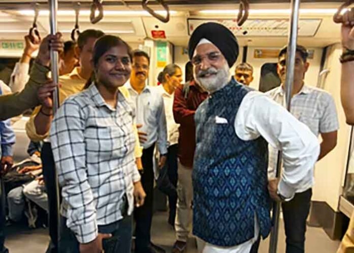 Delhi LG TS Sandhu rides Metro