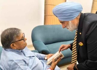 Dr. Thakar Singh Ikolaha presented to Punjab Governor Gulab Chand Kataria