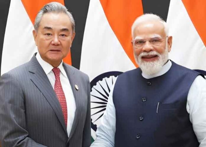 Chinese FM Wang Yi meets PM Modi