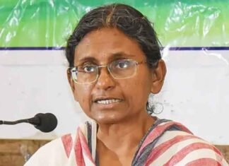 Meenakshi Natarajan on mic