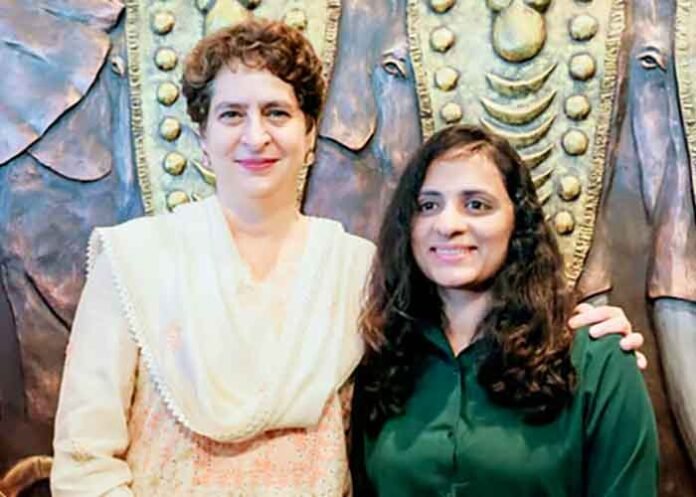 Priyanka Gandhi with mountaineer Zuhra Cherukappalli