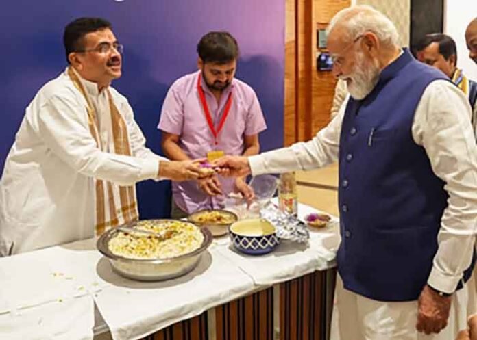 Suvendu Adhikari serves jhalmuri to PM Modi