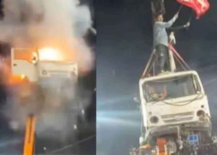vehicle suspended from a crane exploded during a Muharram procession in Badnagar