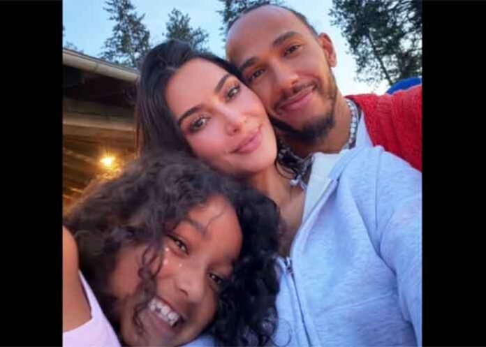 Kim Kardashian with her children and Lewis Hamilton