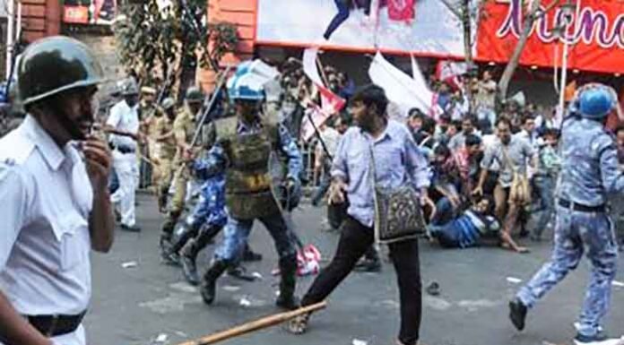 Kolkata Police after violence during a NEET protest rally