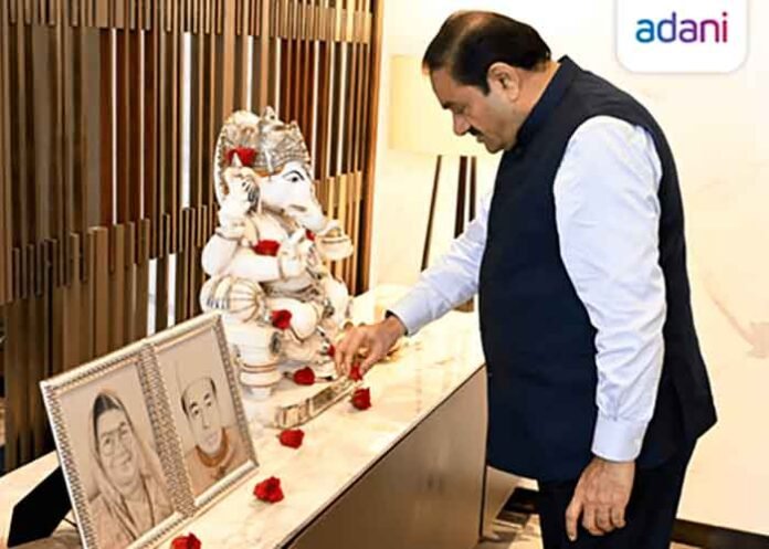 Gautam Adani takes blessings from God