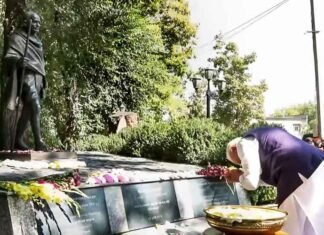 PM Modi Pays Tribute to Mahatma Gandhi in Bishkek, Interacts With Indian Community PM Modi pays tribute to Mahatma Gandhi in Kyrgyzstan