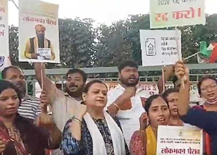 PhD holders and research scholars march towards Lok Bhawan in Patna