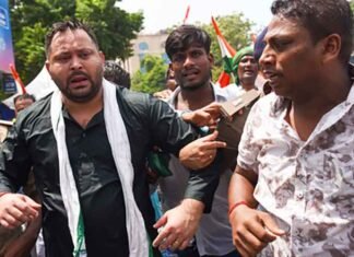 Tejashwi Yadav Detained During RJD Protest March in Patna, Water Cannons Used Tejashwi Yadav detained during protest march in Patna