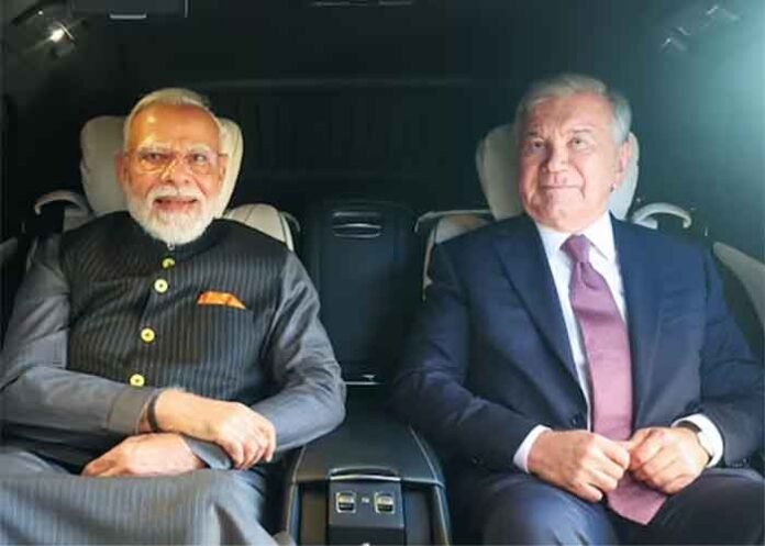 Uzbekistan President Shavkat Mirziyoyev PM Modi in car