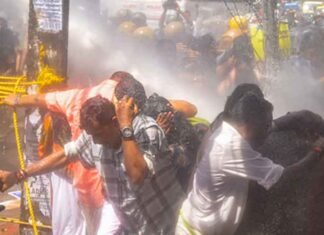 Water Cannons Used on Karni Sena Protesters During Jaipur Rally Water cannons used on Karni Sena protesters in Jaipur